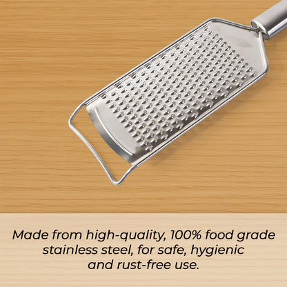 Wukusy Supermom stainless steel carrot grater for kitchen, showing the handheld grater with textured surface for shredding carrots.