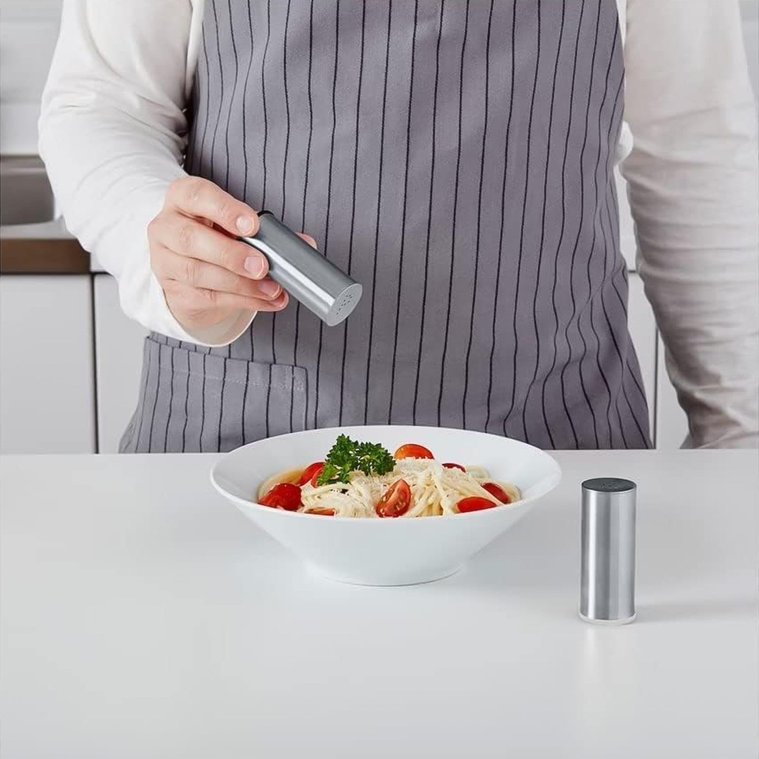 Wukusy stainless steel salt and pepper shaker set with sleek, modern design and clear shakers for easy seasoning identification