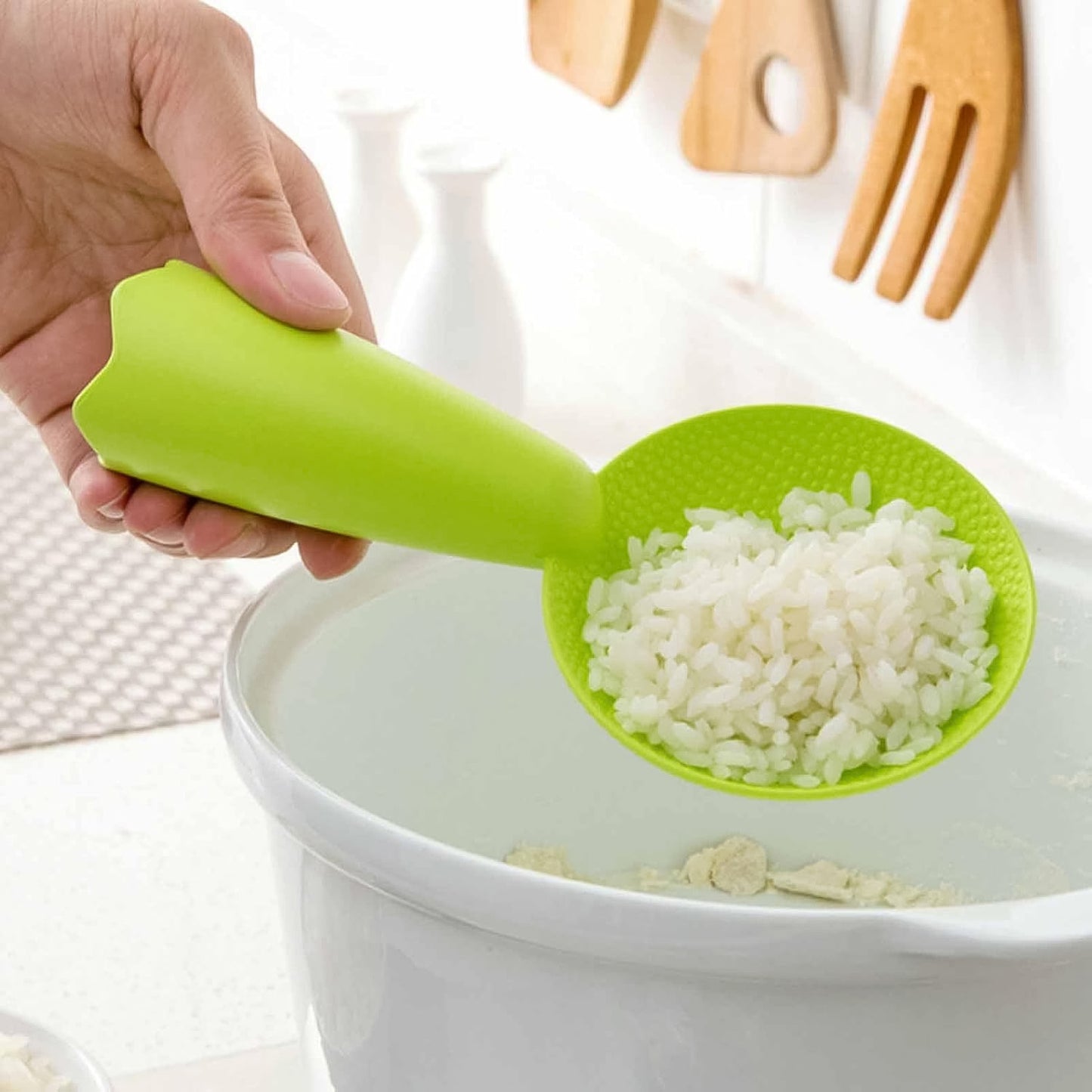Wukusy premium non-stick rice serving spoon with a comfortable handle, ideal for serving rice in home and kitchen settings