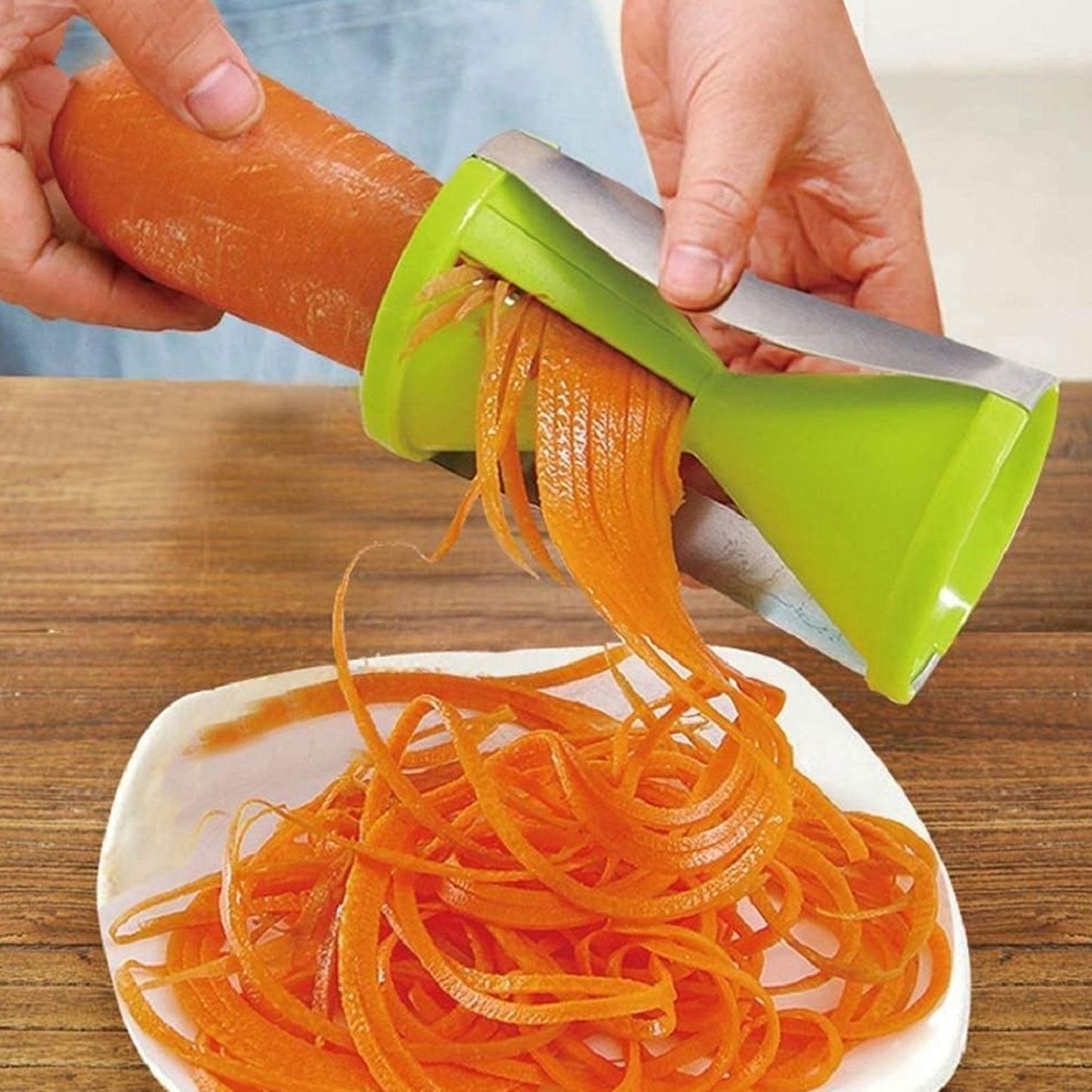 Wukusy 1853 portable spiralizer vegetable slicer with stainless steel blades for spiralizing fruits and vegetables for salads.