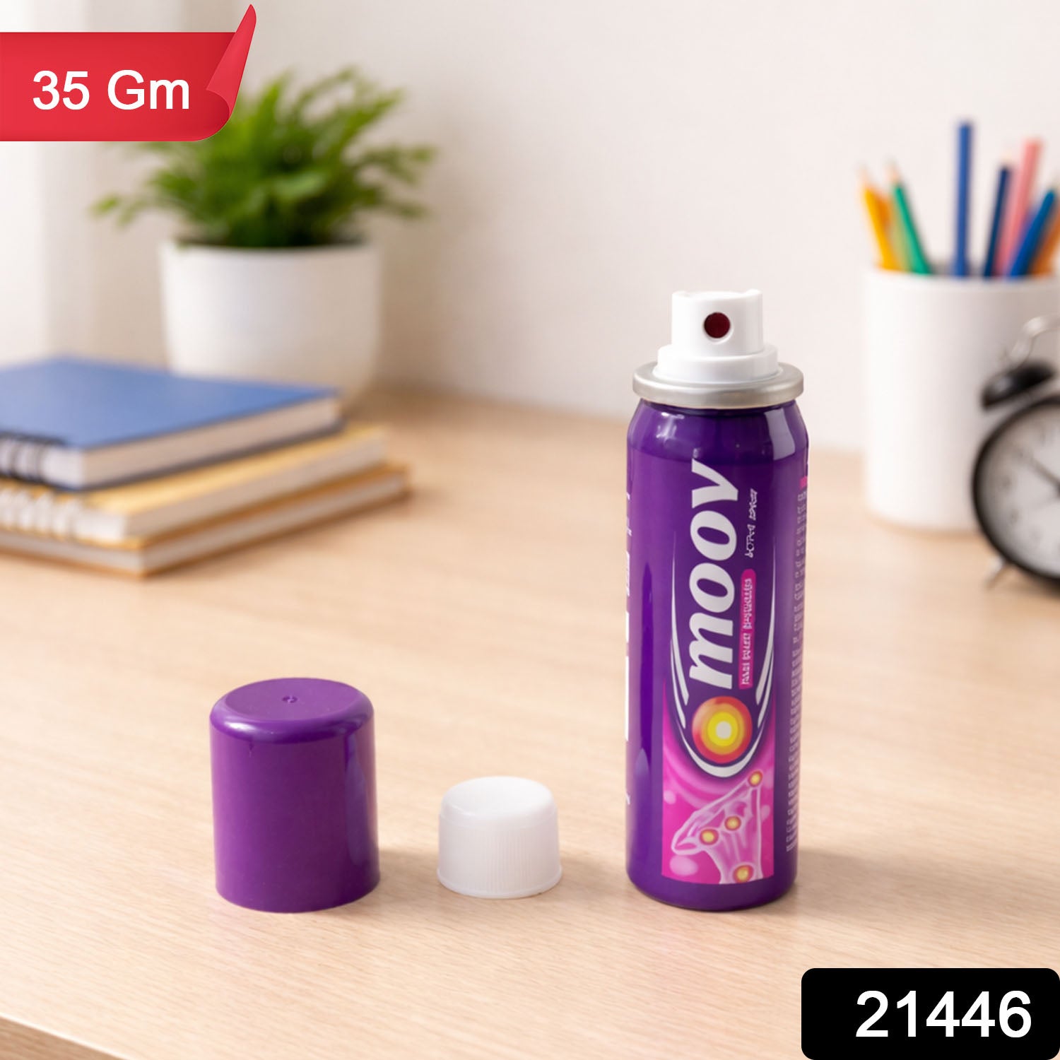 Wukusy Moov Spray for fast muscle pain relief, 35g bottle, showing the spray bottle with label and product packaging.