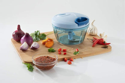 Wukusy 7008 manual stainless steel vegetable chopper with compact design and brown packaging for home and kitchen use.