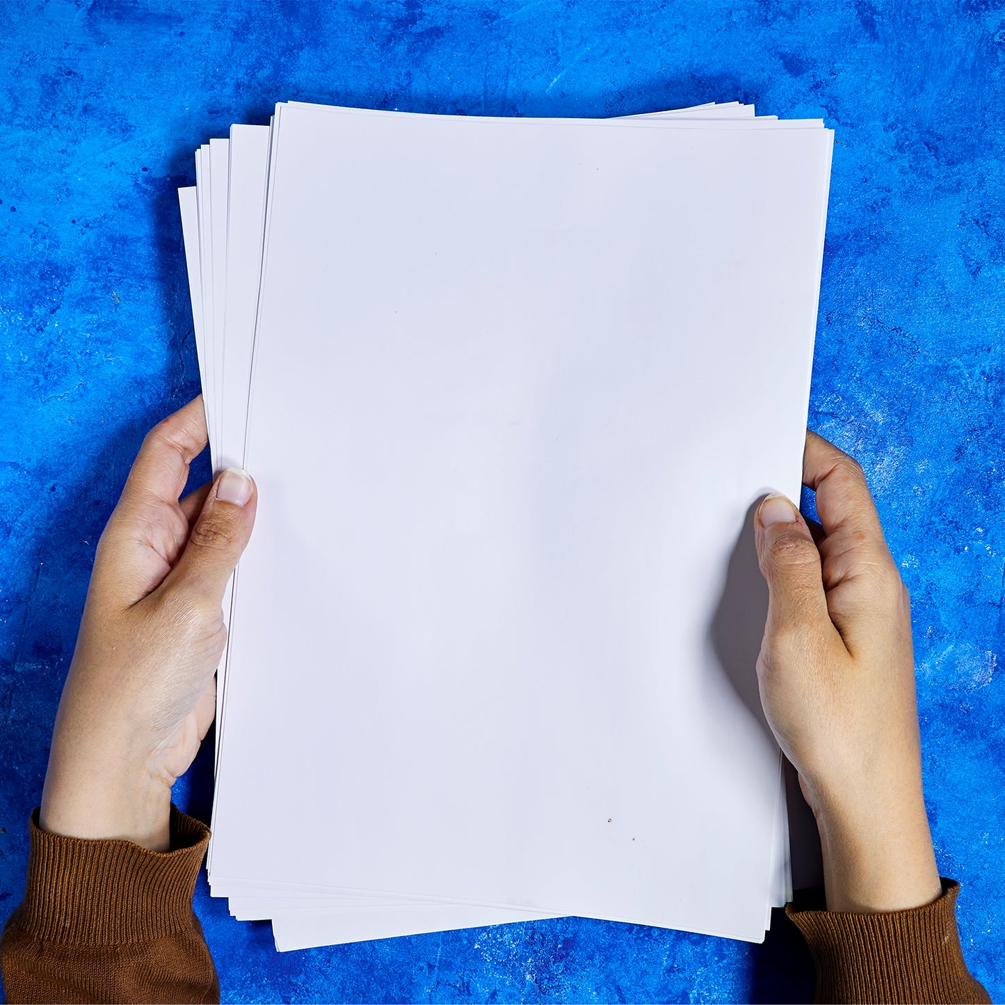 A4 size Wukusy high brightness copier paper pack with 500 sheets, 70 GSM, suitable for office printing and copying.