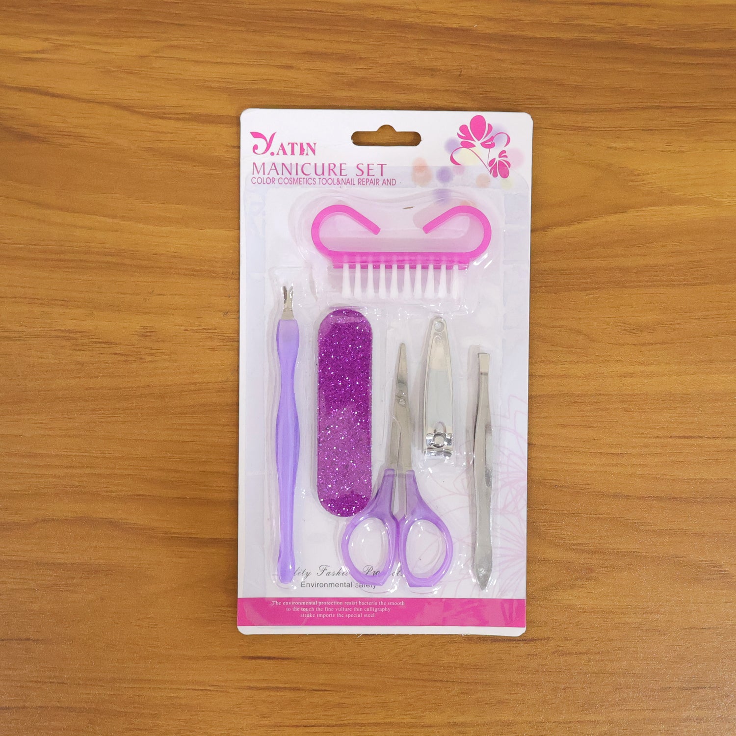 Wukusy 6-in-1 manicure and pedicure nail care kit with various tools for nail grooming and shaping.