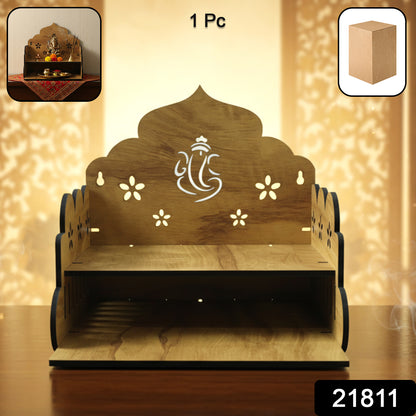 Wooden temple style home mandir stand for pooja with intricate carvings, designed by Wukusy for traditional worship spaces.
