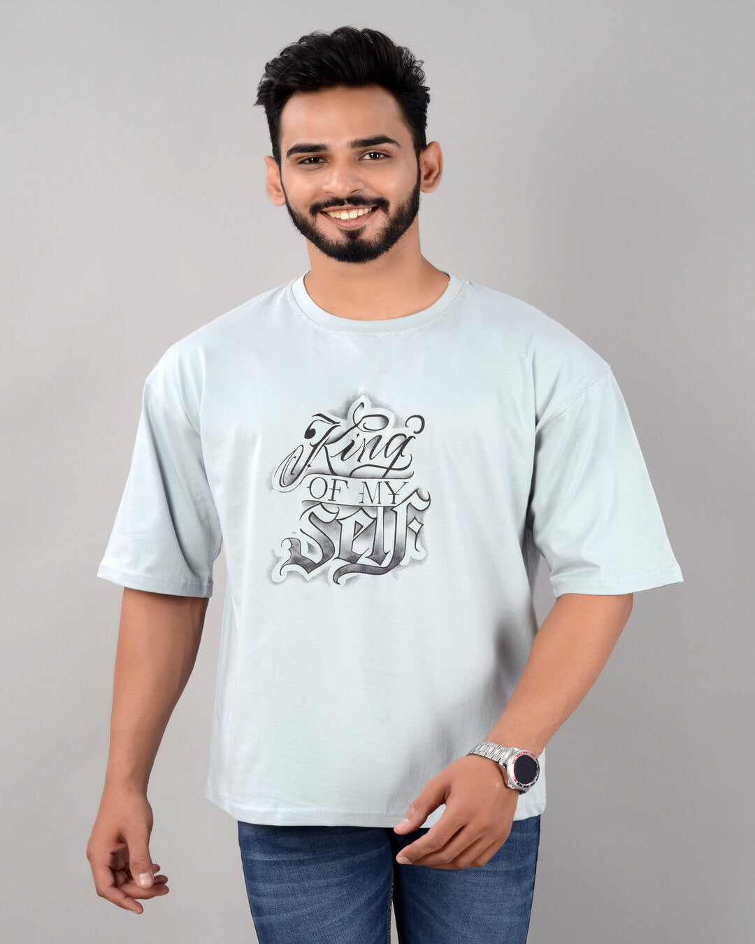 Men's turquoise cotton blend oversized T-shirt with drop shoulder, round neck, half sleeves, and graphic print from Drpshippr.
