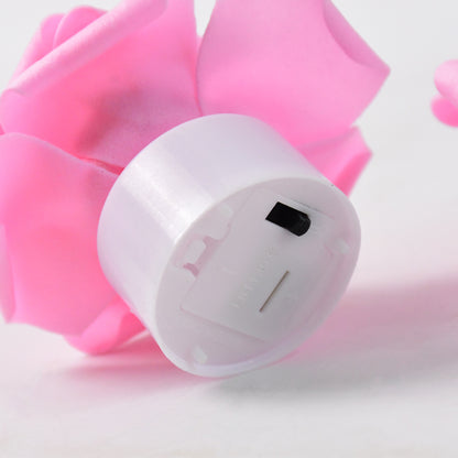 Set of two Wukusy rose-shaped LED flickering tealight candles, perfect for romantic home decor and cozy ambiance.