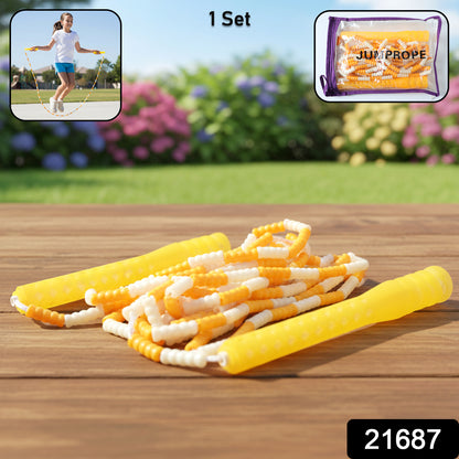 Yellow and white beaded skipping jump rope by Wukusy, coiled with colorful beads, suitable for exercise and fitness activities.