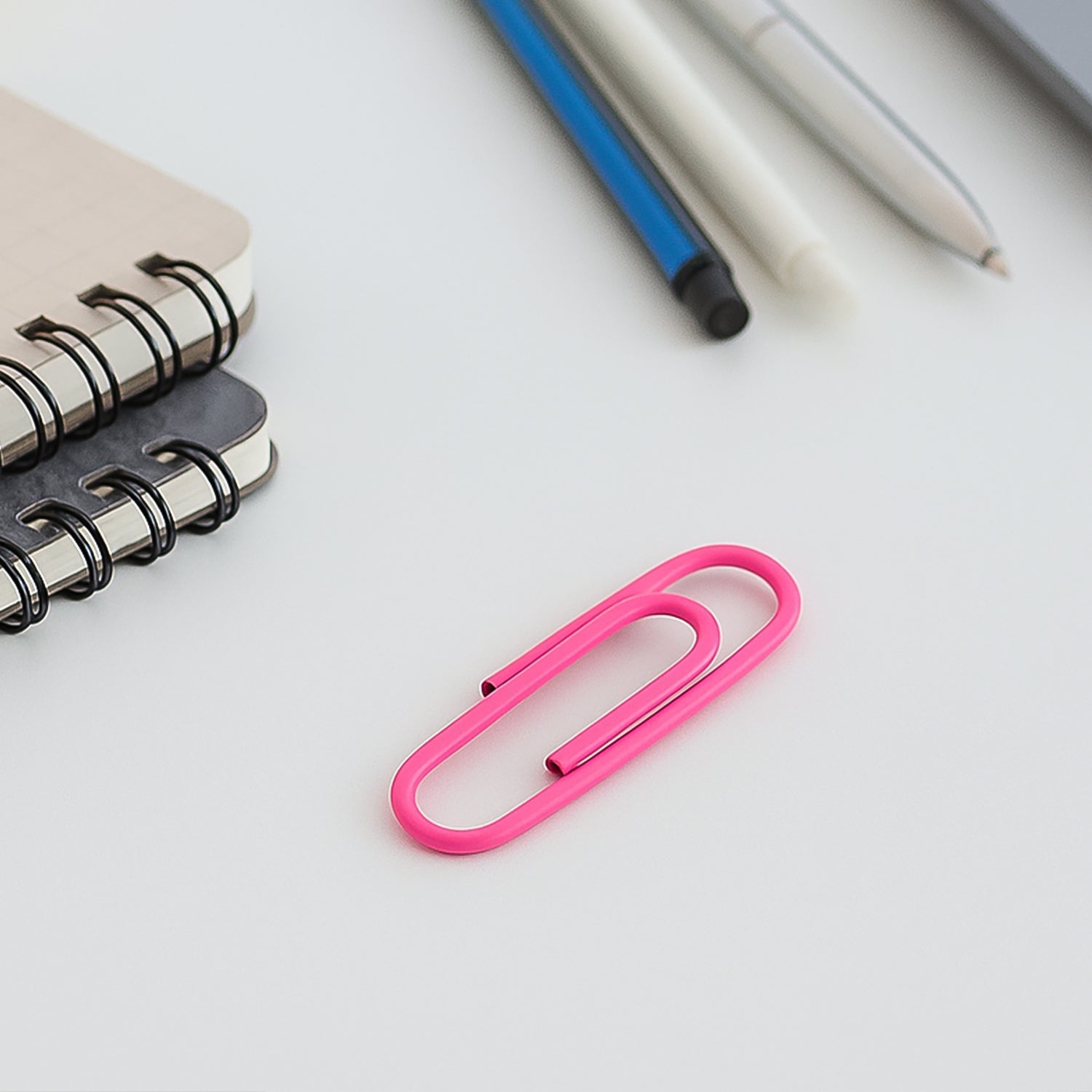 Set of 10 vinyl-coated paper clips by Wukusy, durable office supplies for organizing papers and documents efficiently.