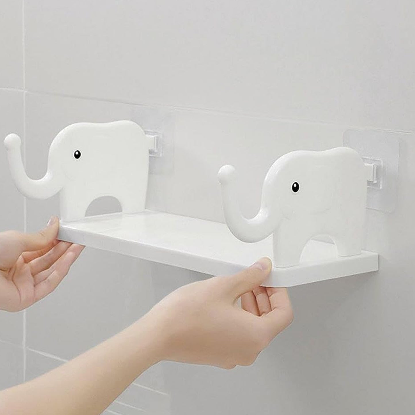Wukusy elephant-shaped wall-mounted storage shelf for kitchen, bathroom, or bedroom, featuring a cute, multifunctional mini organizer.