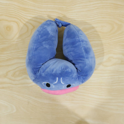 Blue U-shaped travel neck pillow with cute character design from Wukusy, providing soft support for comfortable journeys.