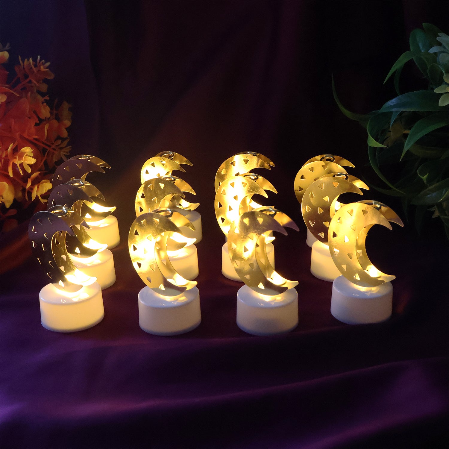 Set of 12 decorative moon-shaped flameless LED candles by Wukusy for home decor, featuring warm glowing moon designs.