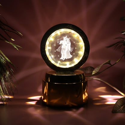 Wukusy Radhe Krishna crystal ball night light for office, featuring intricate design and soft illumination in a decorative display