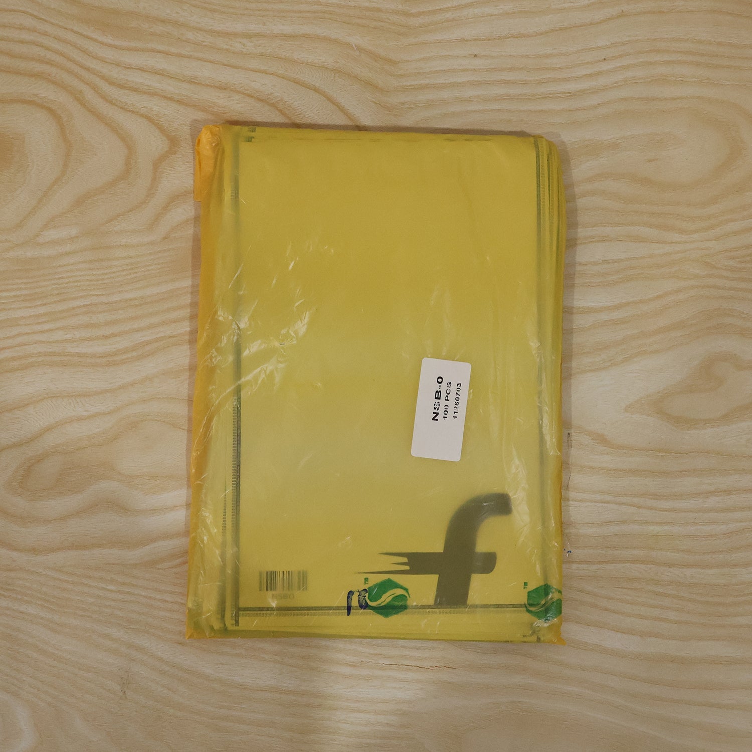 Pack of 100 Wukusy courier bags, tamper-proof polybags, 6.5 x 8 inches, suitable for secure shipping and packaging.