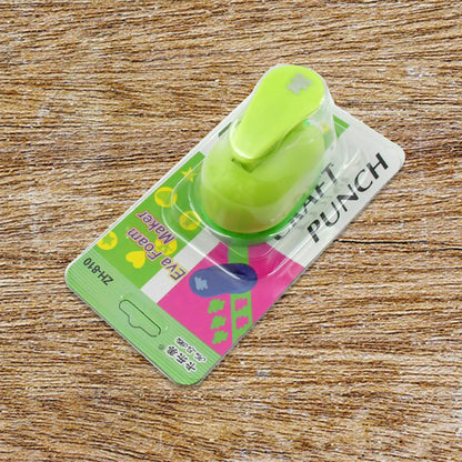 Wukusy 4561 hole punch kids paper craft puncher with decorative design for scrapbooking and nail art crafting, in use.