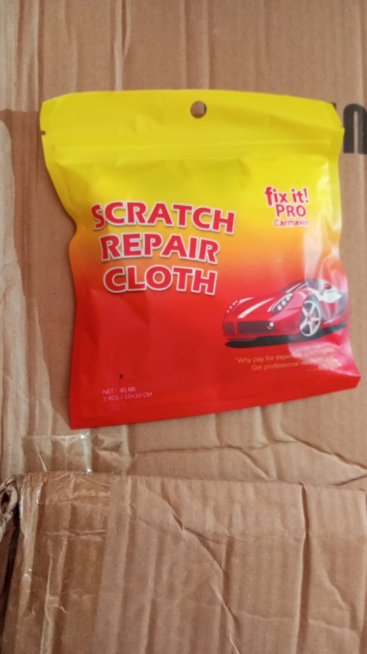 Wukusy Nano Magic Car Scratch Remover Cloth and Repair Solution for car paint scratches, includes gloves and multiple nano cloths.
