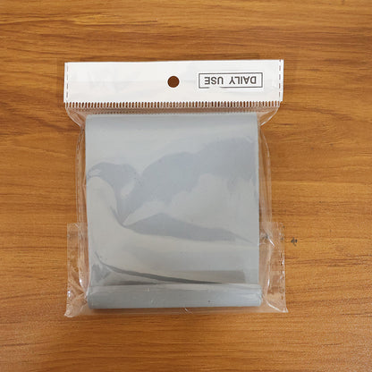 Wukusy plastic foldable desktop mobile stand supporting a smartphone in a vertical position on a clean white background.