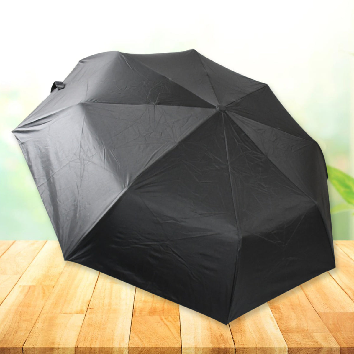 Wukusy 2-fold manual open umbrella with steel shaft, windproof and rainproof, featuring wrist straps for easy carrying for women, men, and kids.