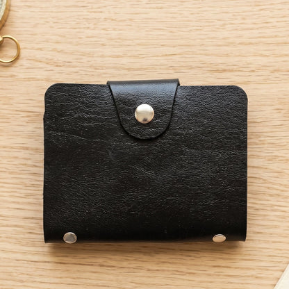 Slim Wukusy card holder wallet made of durable PU leather, designed for organizing cards in a compact, stylish manner.