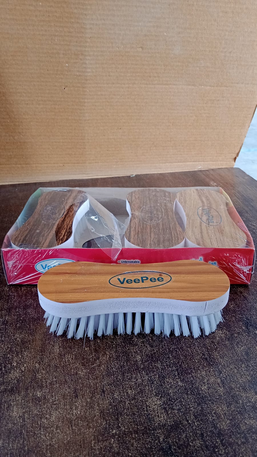 Wukusy ergonomic cloth washing brush set with four durable brushes for cleaning clothes and household surfaces.
