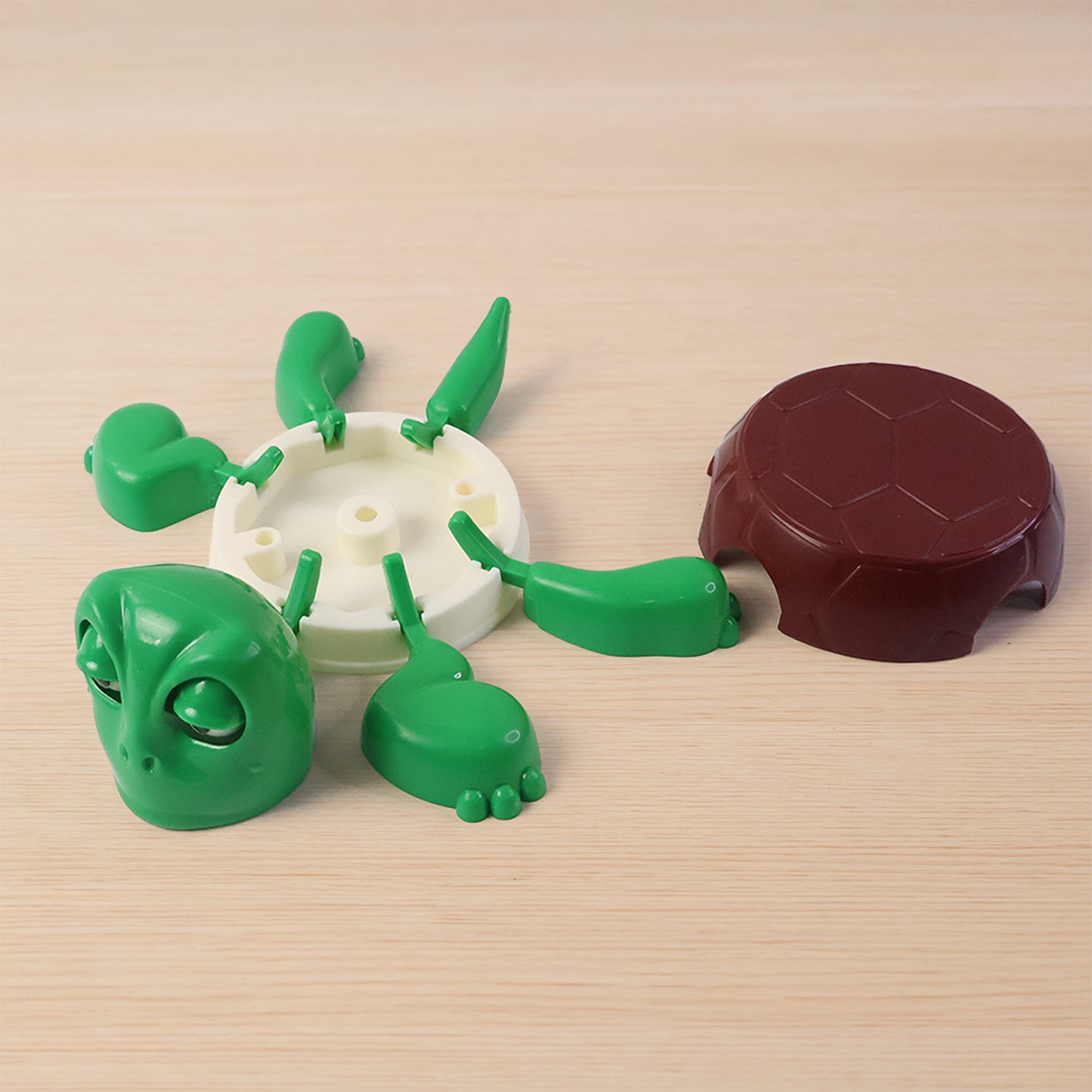 Cute plastic turtle-shaped coaster for cups from Wukusy, ideal for home and kitchen use, featuring a colorful turtle design.