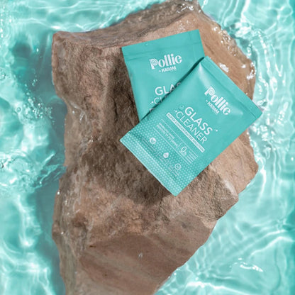 Wukusy Pollic Kadam concentrated glass mirror cleaner sachet, 15g, for home improvement, with a shiny mirror reflecting in the background.