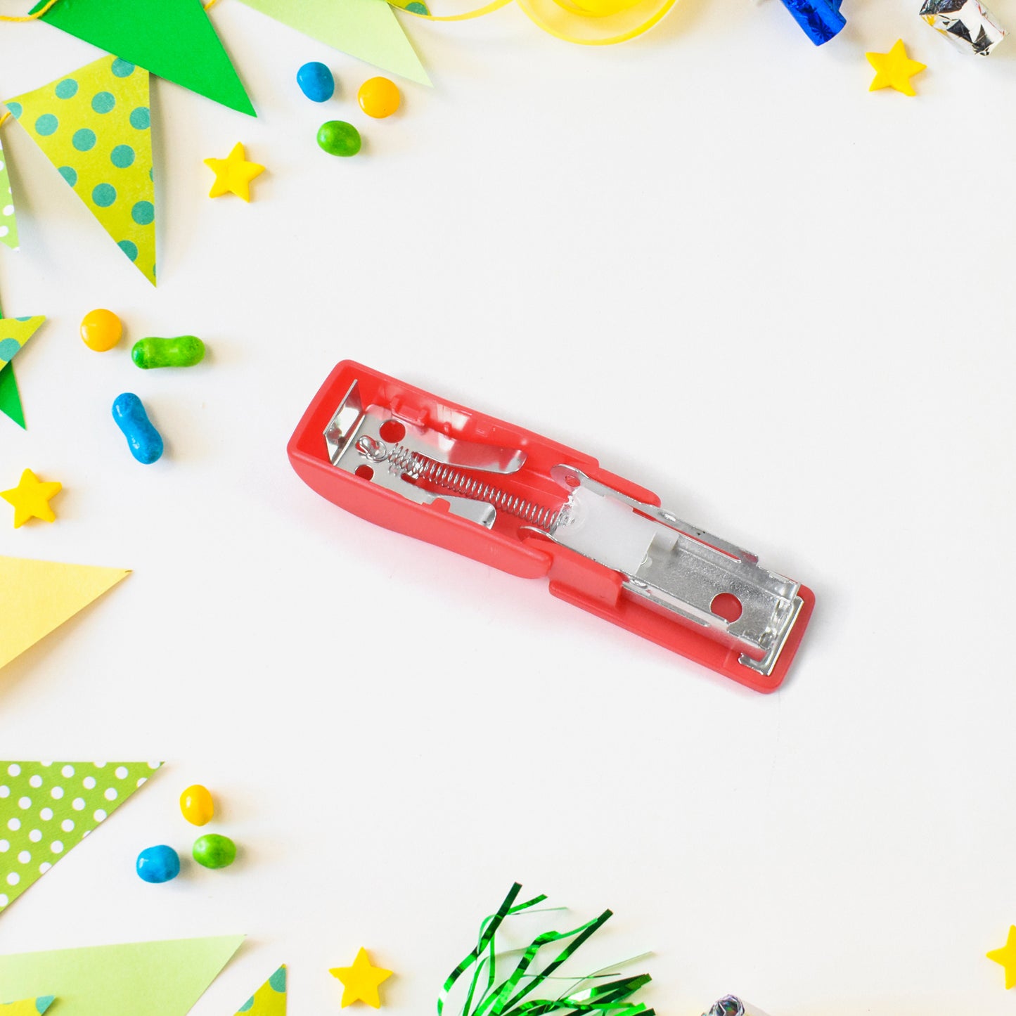 Wukusy mini office stapler with staples and pin set, compact and portable for everyday paper fastening tasks.