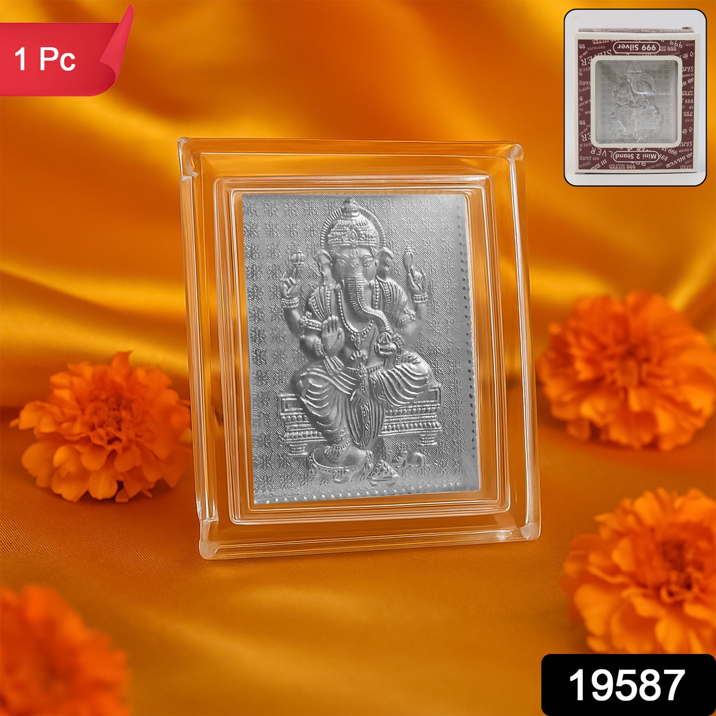 Silver-plated Lord Ganesha embossed photo frame for home decor, featuring intricate design and religious artwork.