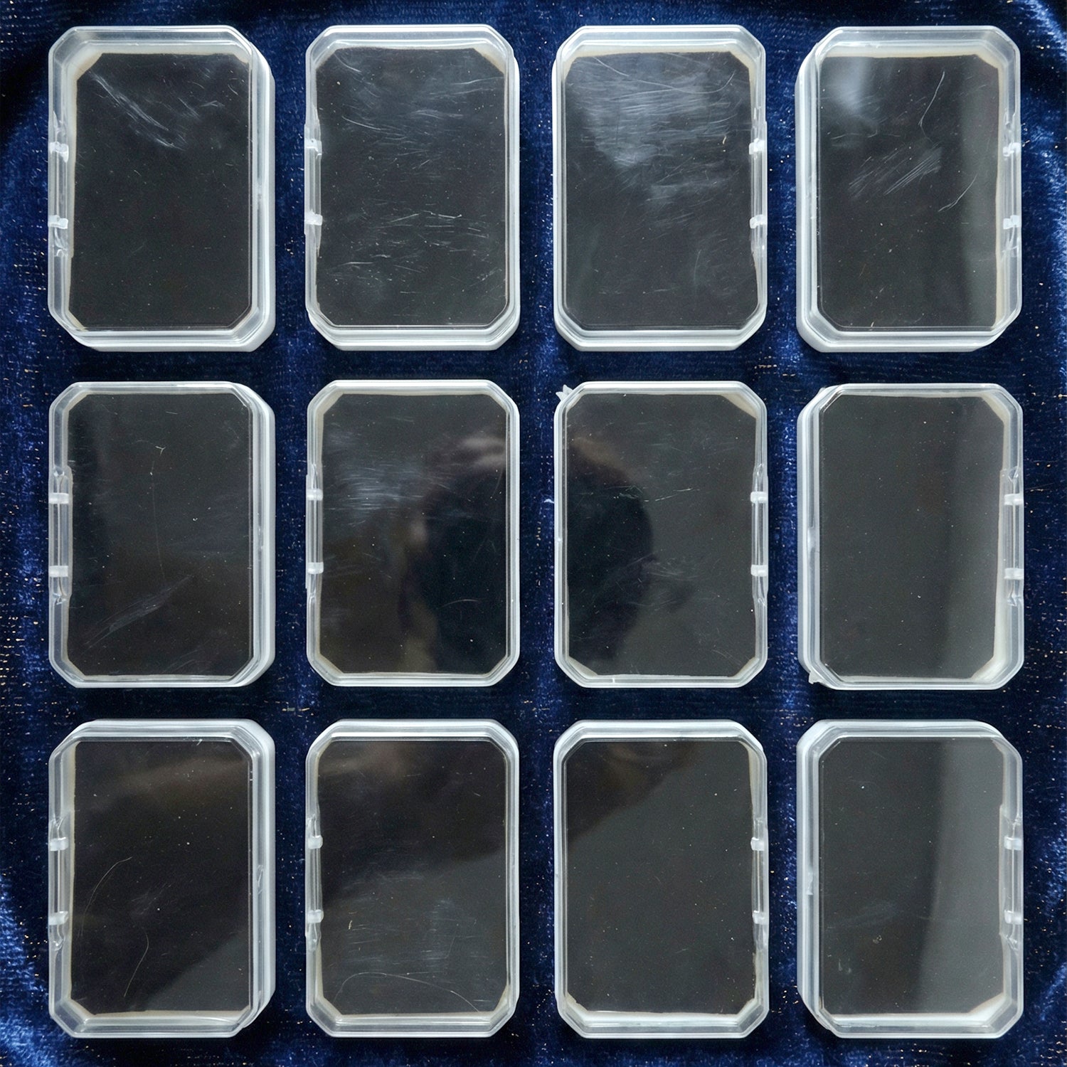 Wukusy jewelry storage box set with 12 small compartments for rings, earrings, and accessories, in a compact organizer.