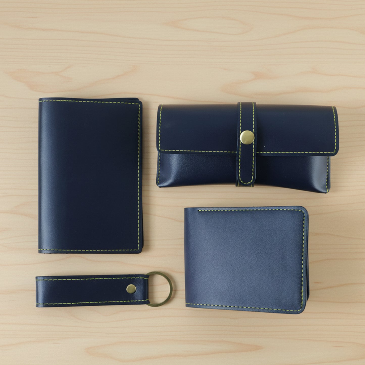 Wukusy 4-in-1 men's premium PU leather wallet gift set with four different wallets in black and brown leather, displayed on a neutral background.