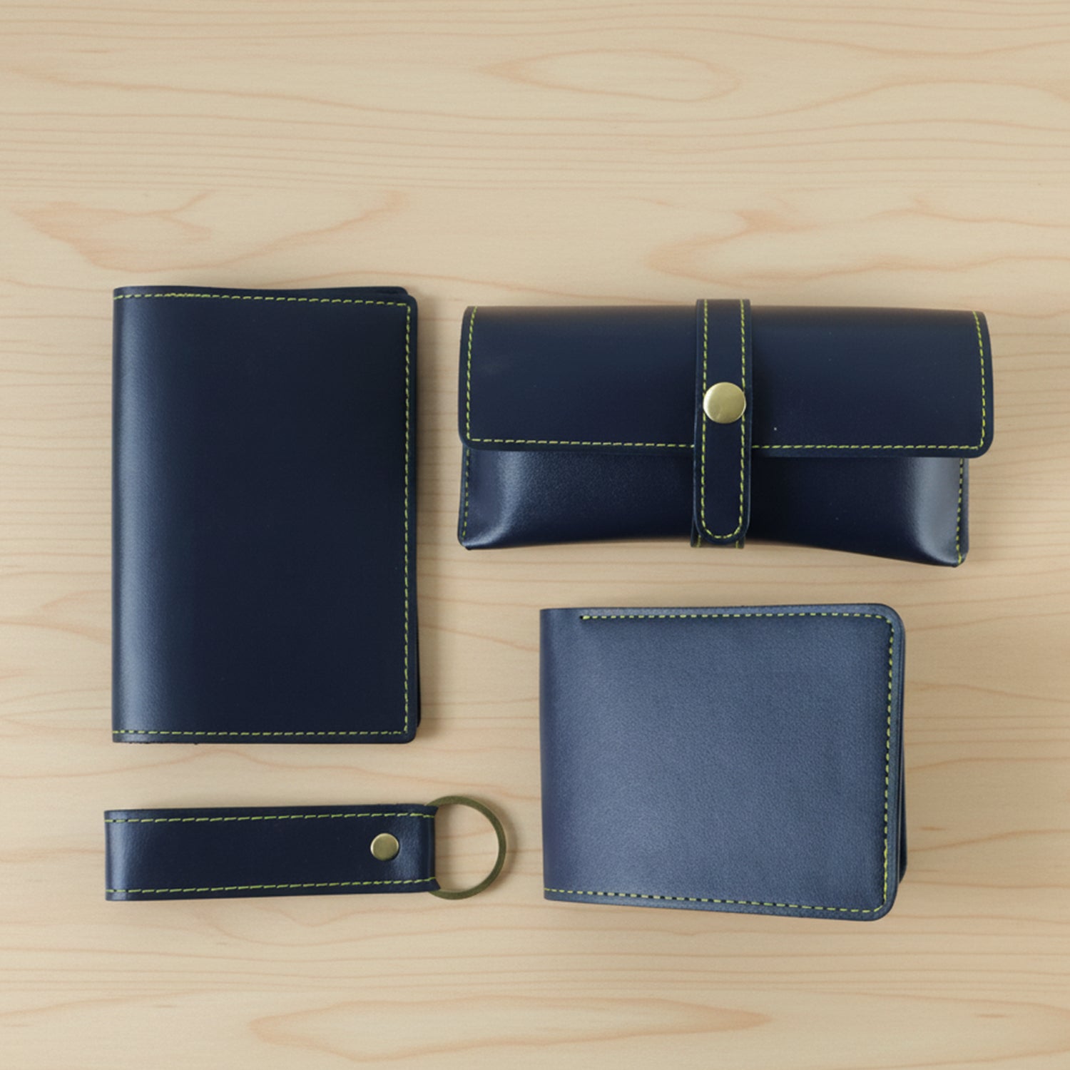 Wukusy 4-in-1 men's premium PU leather wallet gift set with four different wallets in black and brown leather, displayed on a neutral background.