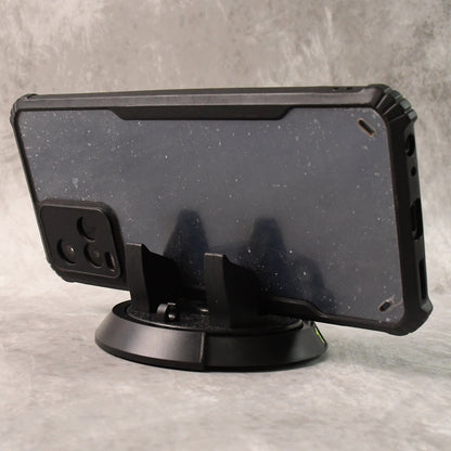 Wukusy multipurpose car dashboard mobile phone holder stand mounted on car dashboard with phone securely in place.