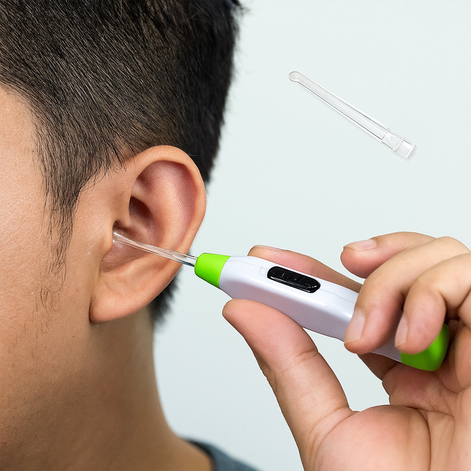 Wukusy 5-in-1 LED flashlight earpick with interchangeable transparent ear wax removal heads, compact and ergonomic design.