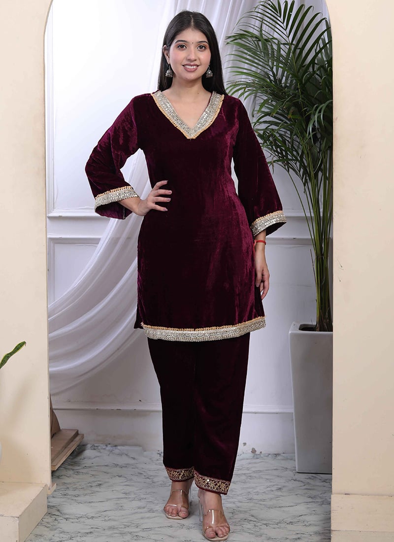 Wine velvet embroidered Indo-Western co-ord set by Drpshippr featuring intricate embroidery and festive style.