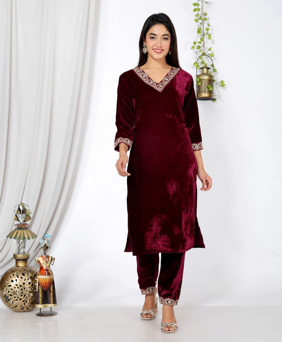 Wine velvet embroidered Indo-Western co-ord set featuring festive wear style with intricate embroidery, designed for elegant occasions.