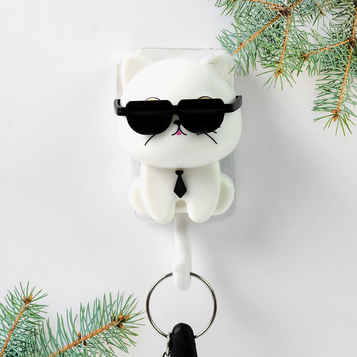 Cute cat-shaped wall hook with sunglasses by Wukusy, perfect for hanging keys or small items in home decor.