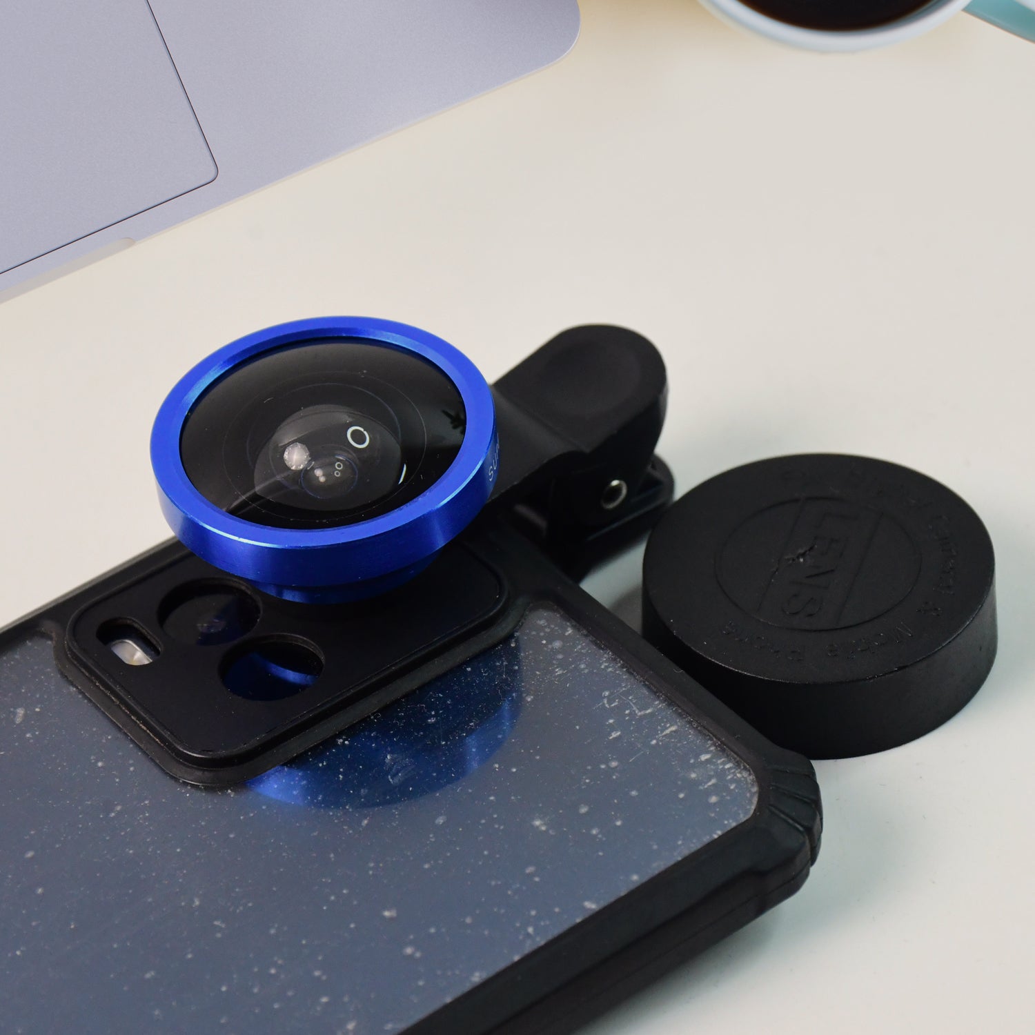 Wukusy universal clip-on selfie camera lens set attached to a smartphone for enhanced photography and wide-angle shots.
