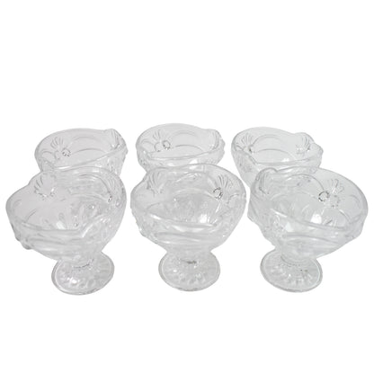 Set of six Wukusy glass ice-cream cups for serving desserts or ice cream in a home kitchen. Clear, round dessert cups with smooth edges.
