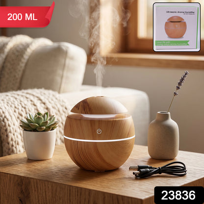 Wukusy ultrasonic aroma diffuser humidifier with 200ml capacity, LED light, suitable for home or office use, shown with mist and lighting.