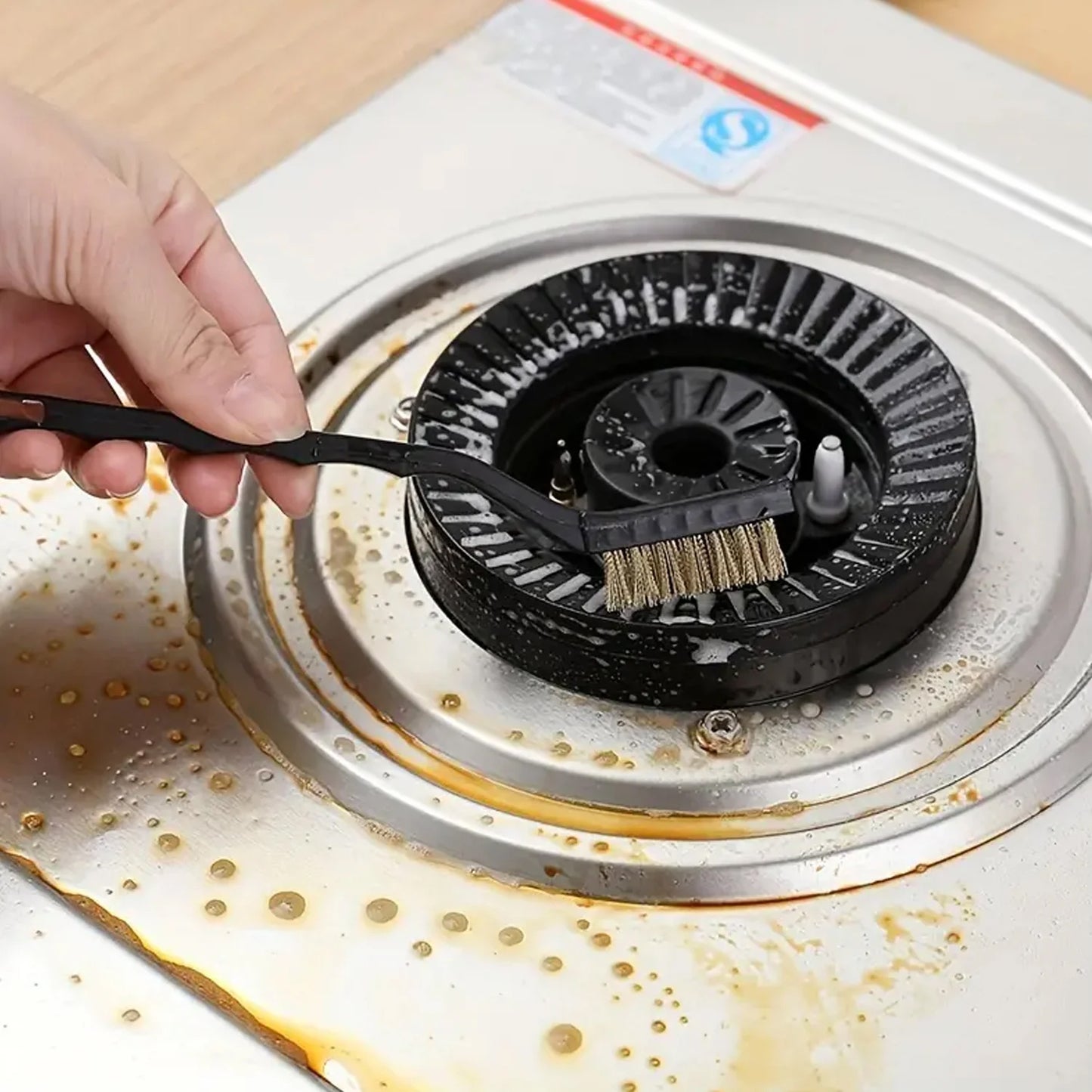 Mini brass wire brush from Wukusy with fine bristles for cleaning and polishing small surfaces or tight spaces.