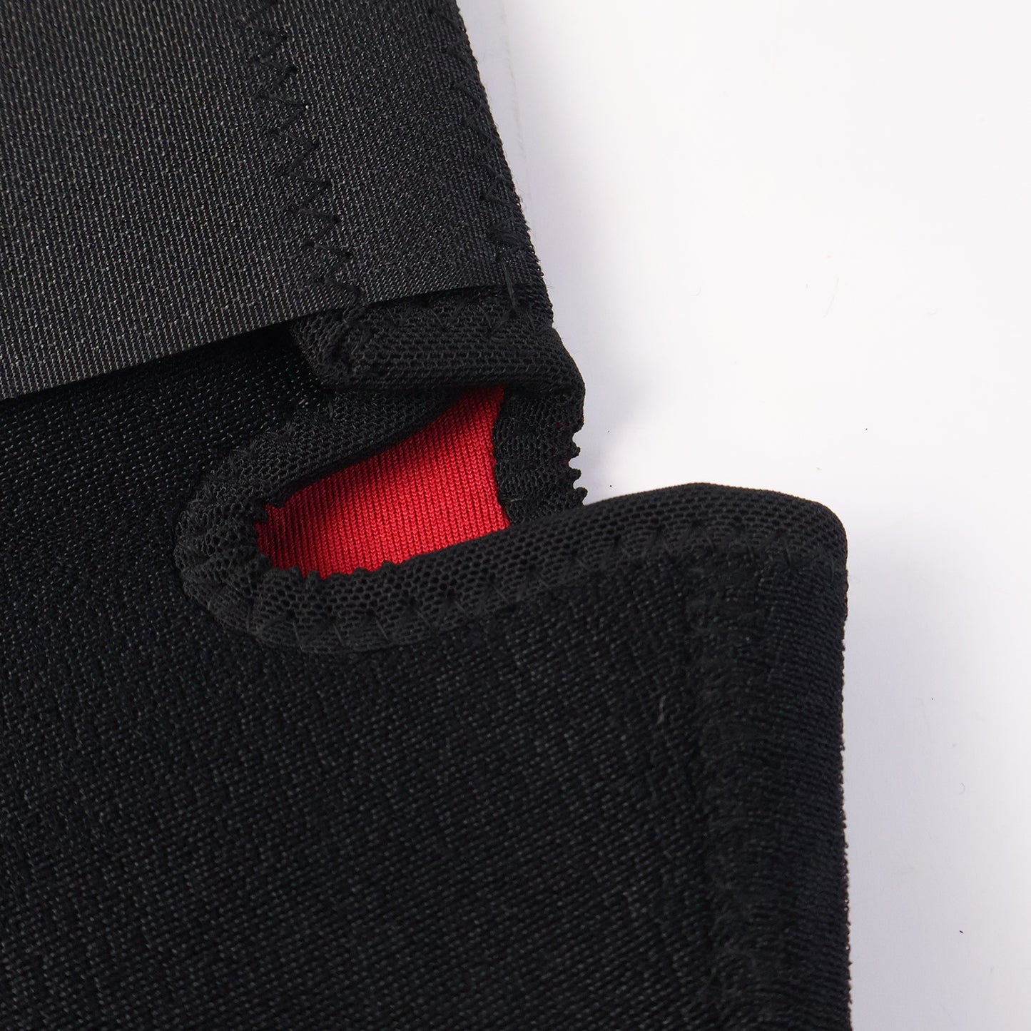 Wukusy adjustable open-patella knee support brace for sports, showing a black, breathable design with adjustable straps.
