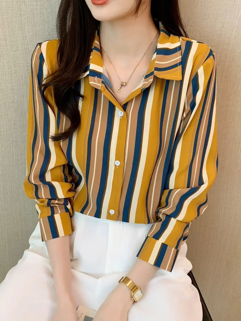 Woman wearing a striped print cotton silk long sleeve collar neck tunic shirt from Drpshippr's women's collection.