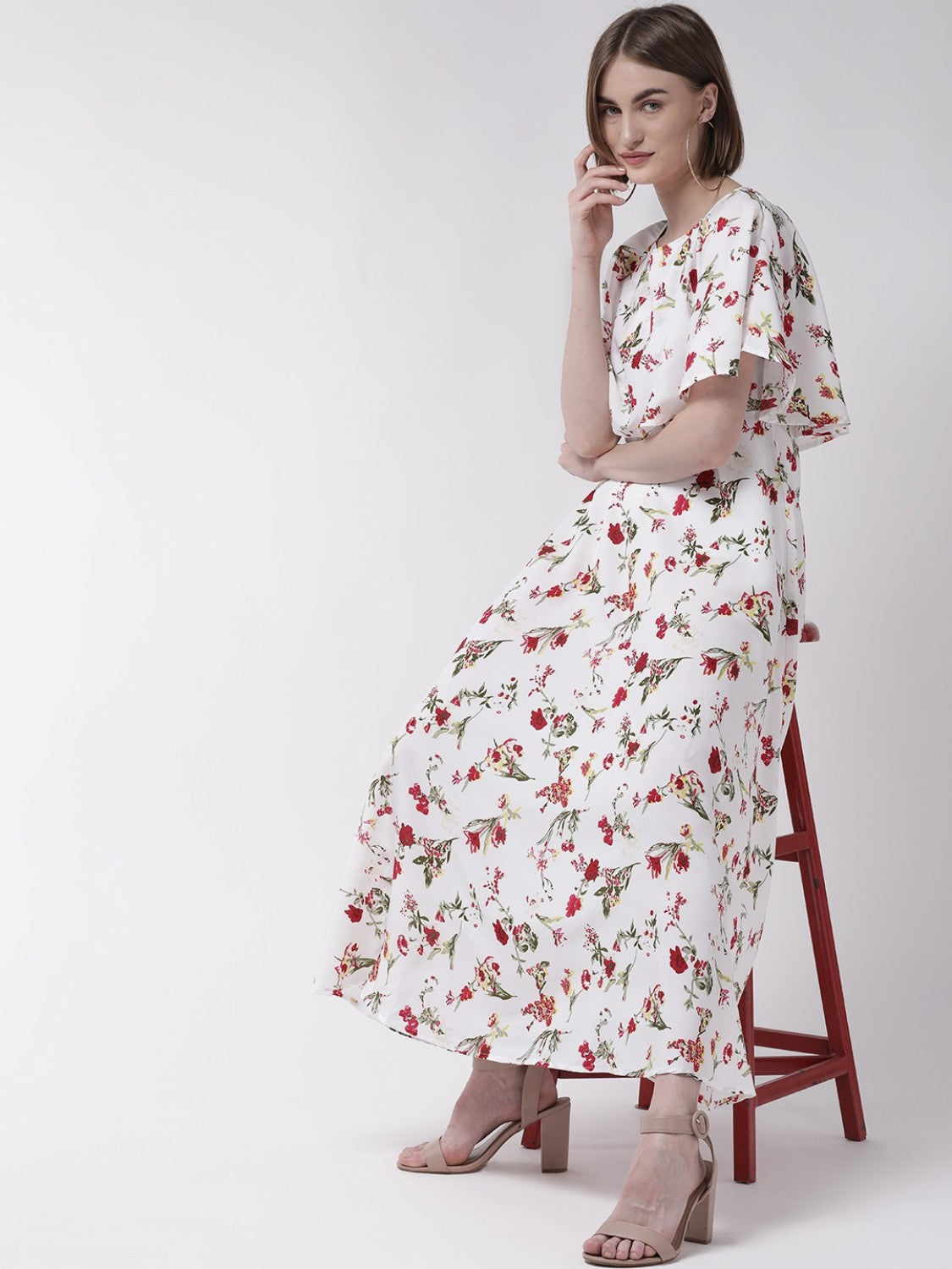 Women wearing a white cape sleeve maxi dress from Drpshippr's Women's Collection, flowing and elegant for formal occasions.