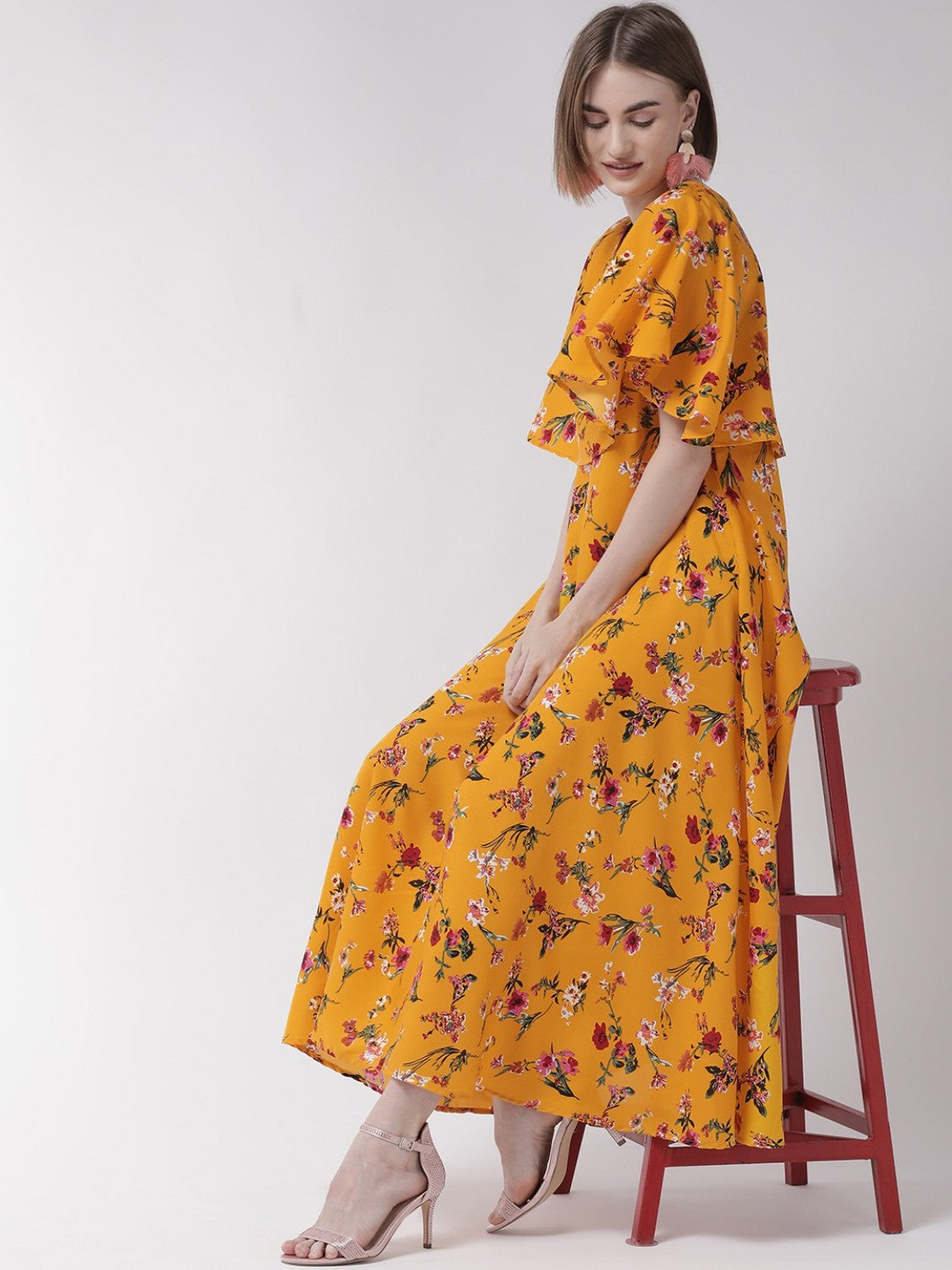 Women wearing a yellow cape sleeve maxi dress from Drpshippr's Women's Collection, flowing and elegant for summer occasions.