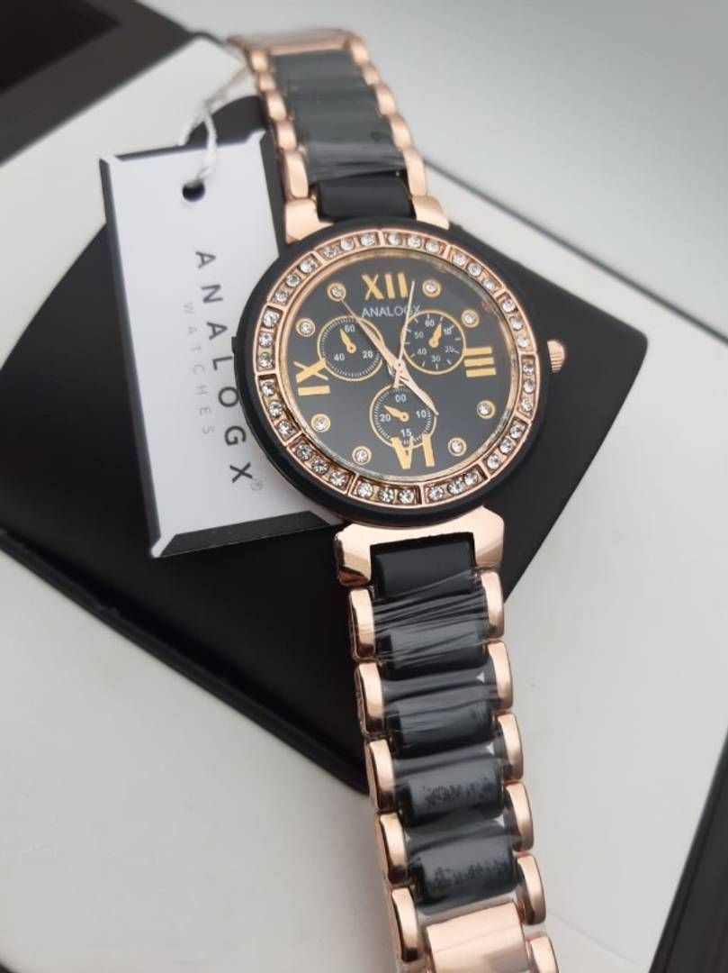 Women’s analog watch from Drpshippr’s Vol-15 collection, featuring a stylish dial and classic design.