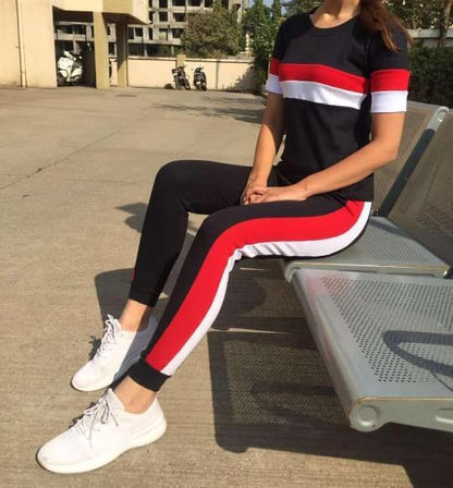 Women's cotton Lycra printed and striped tracksuit from Drpshippr's collection, featuring vibrant patterns and comfortable fit.