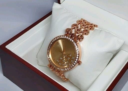 Women's stainless steel analog watch from Drpshippr's Vol-56 collection, featuring a sleek design and classic time display.