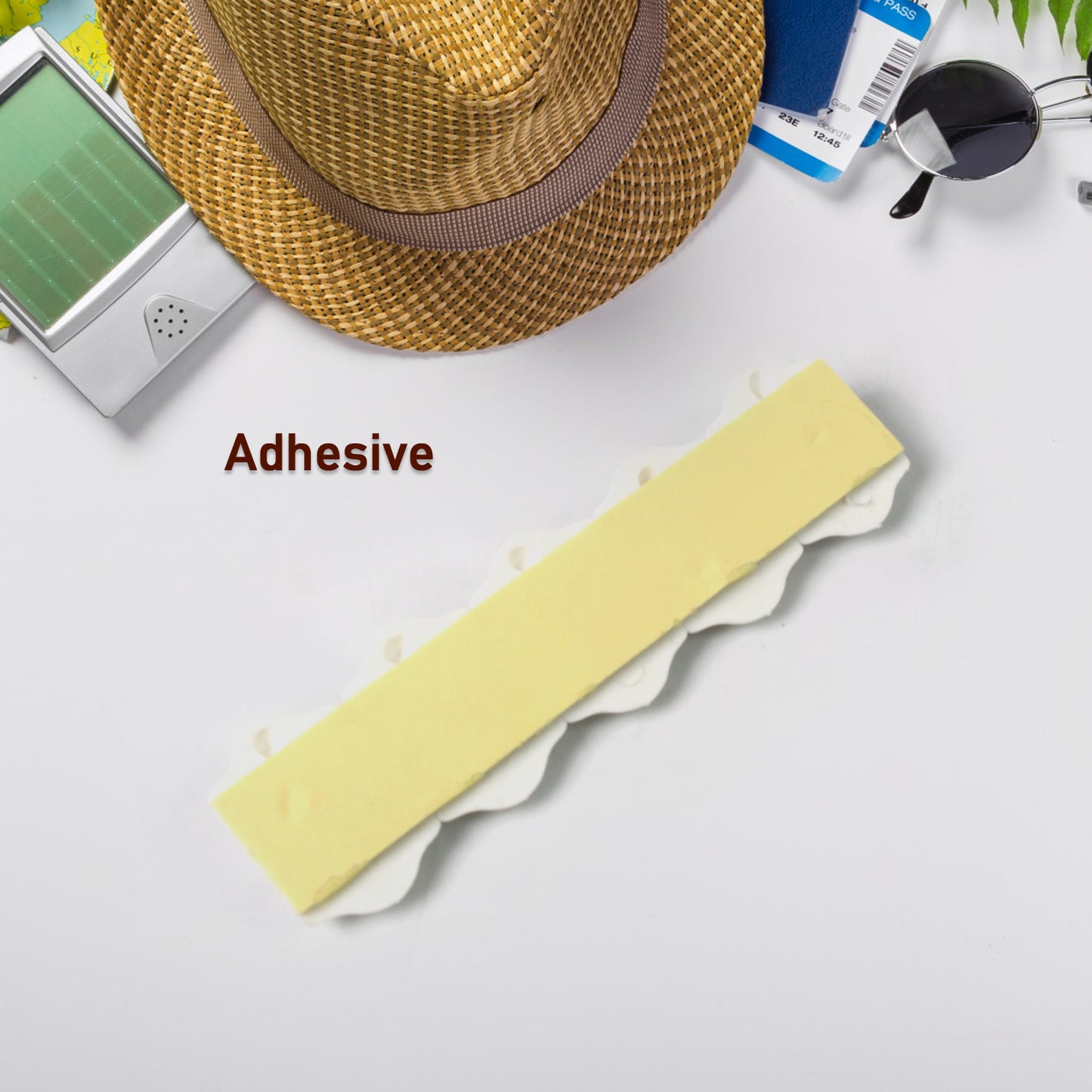 Set of 10 Wukusy small adhesive hooks for wall hanging in home and kitchen, easily attachable and removable for versatile use.