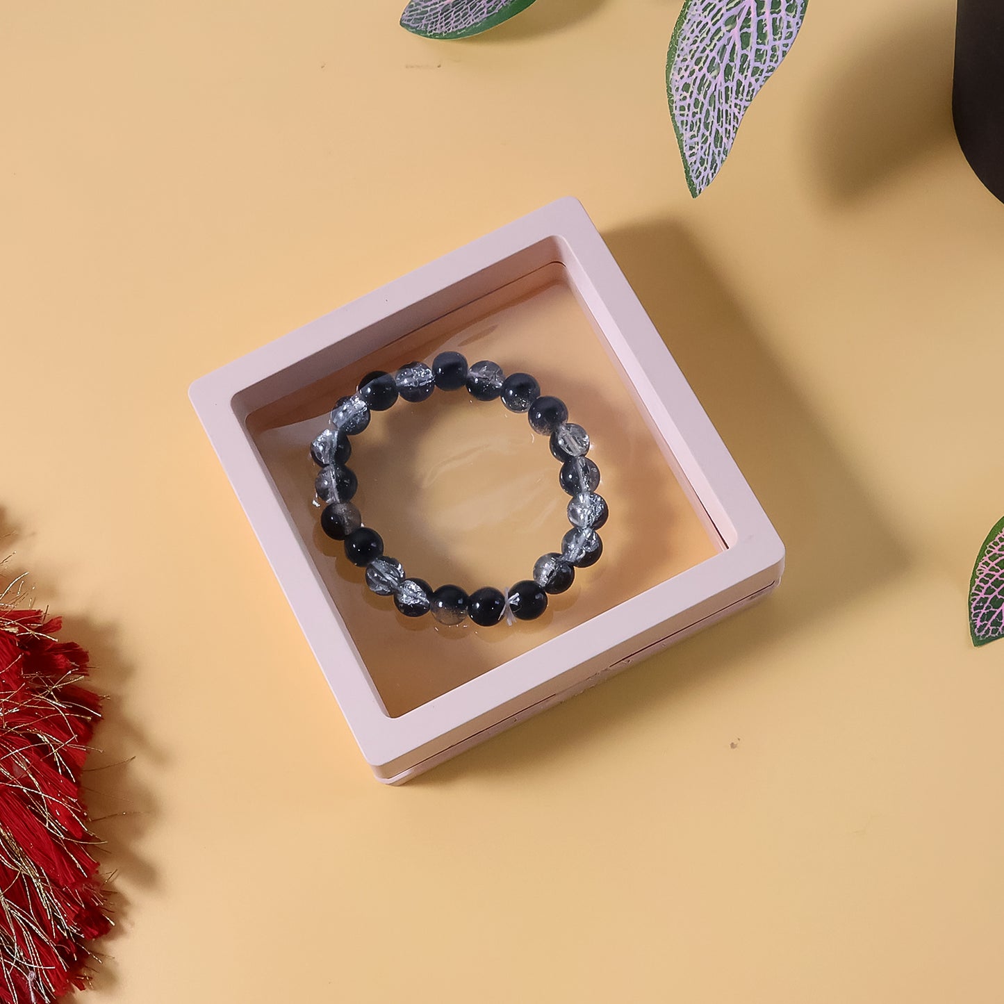 Elegant dual-tone crystal beaded stretch bracelet by Wukusy, featuring shimmering beads and a comfortable elastic fit.