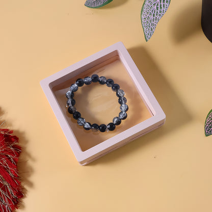 Elegant dual-tone crystal beaded stretch bracelet by Wukusy, featuring shimmering beads and a comfortable elastic fit.